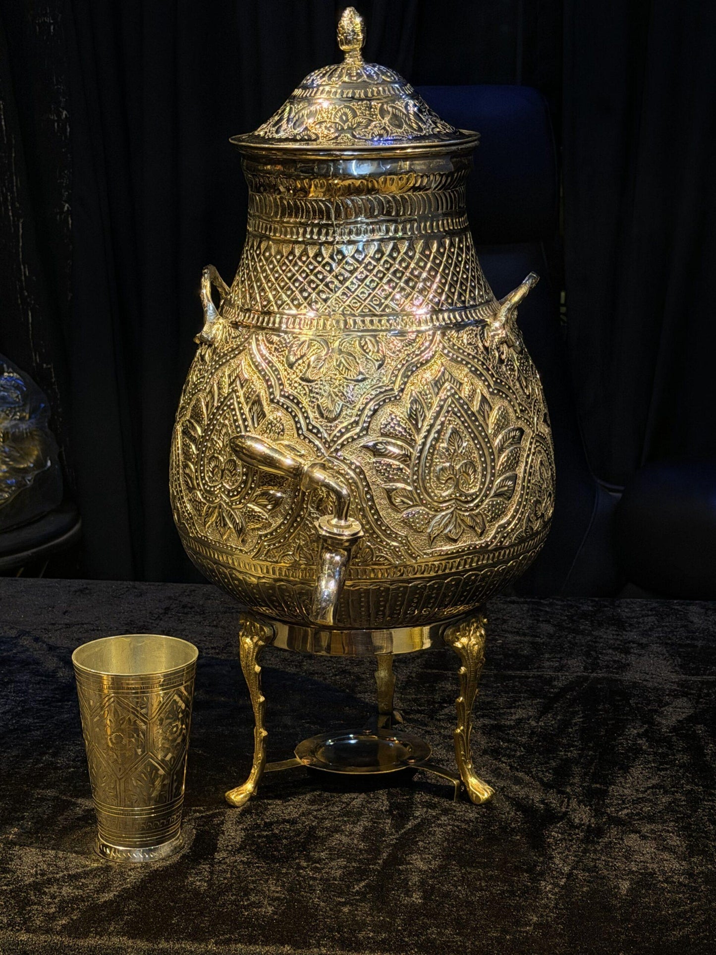 Golden brass tea dispenser