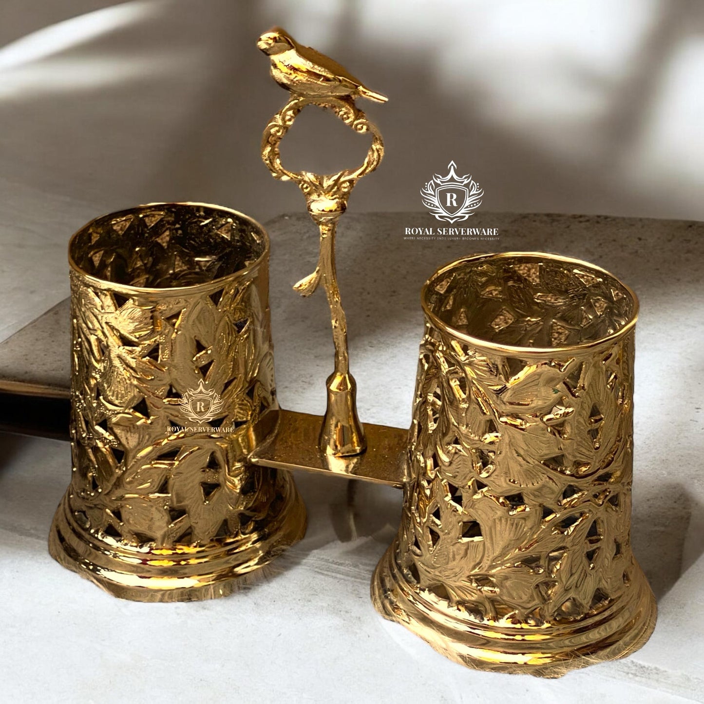 Brass bird cutlery holder