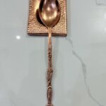 Copper spoon with spoon rest