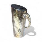 Brass jug with elephant ornament