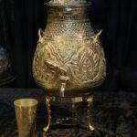 Golden brass tea dispenser